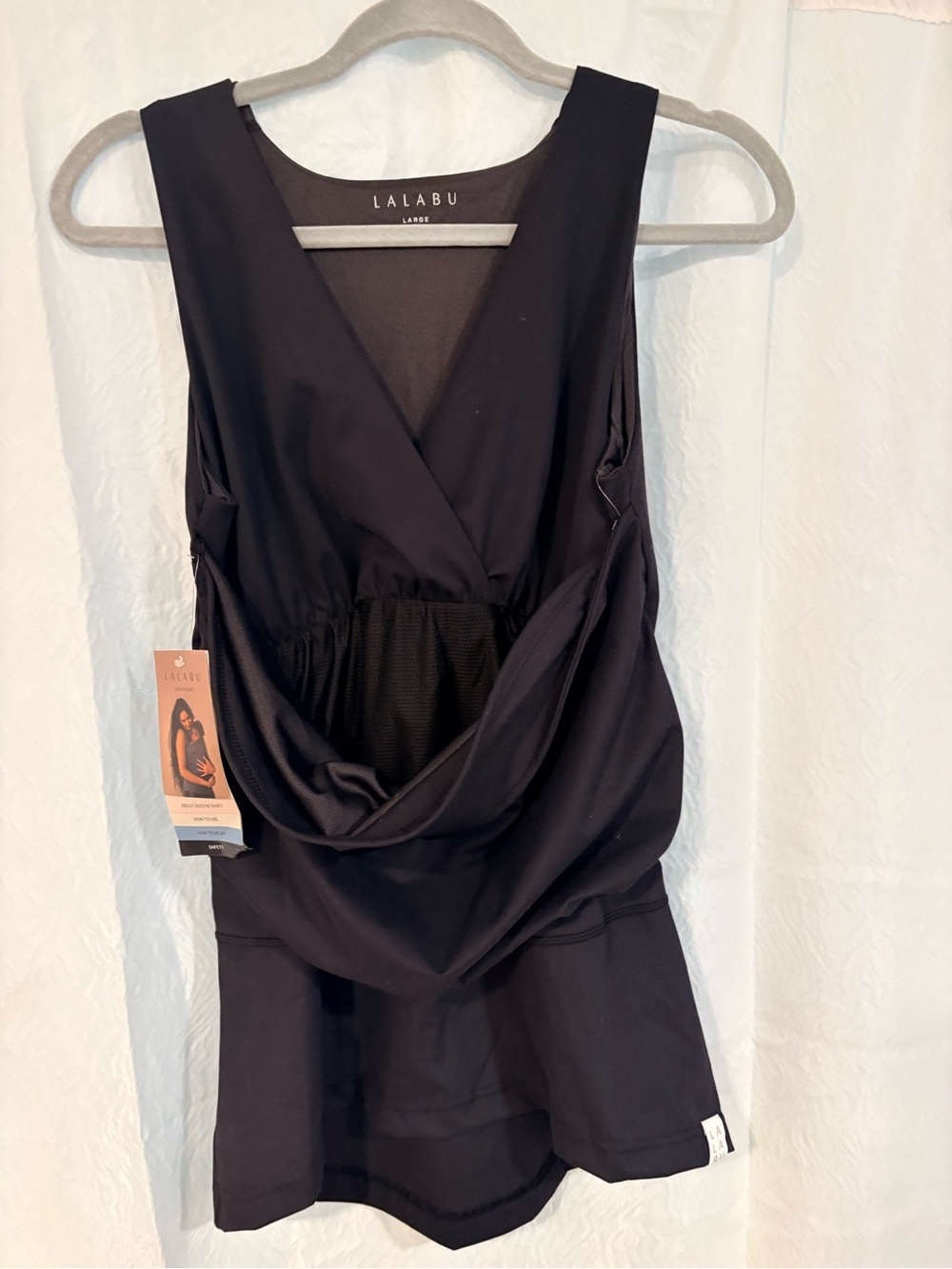 Lalabu black baby wearing shirt